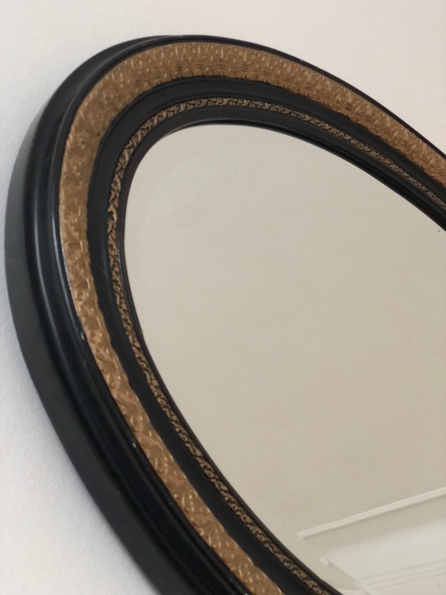 Antique Carved Louis Philippe Oval Mirror In Black and Gold France Late 19th Century