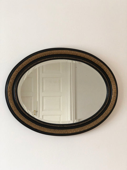 Antique Carved Louis Philippe Oval Mirror In Black and Gold France Late 19th Century