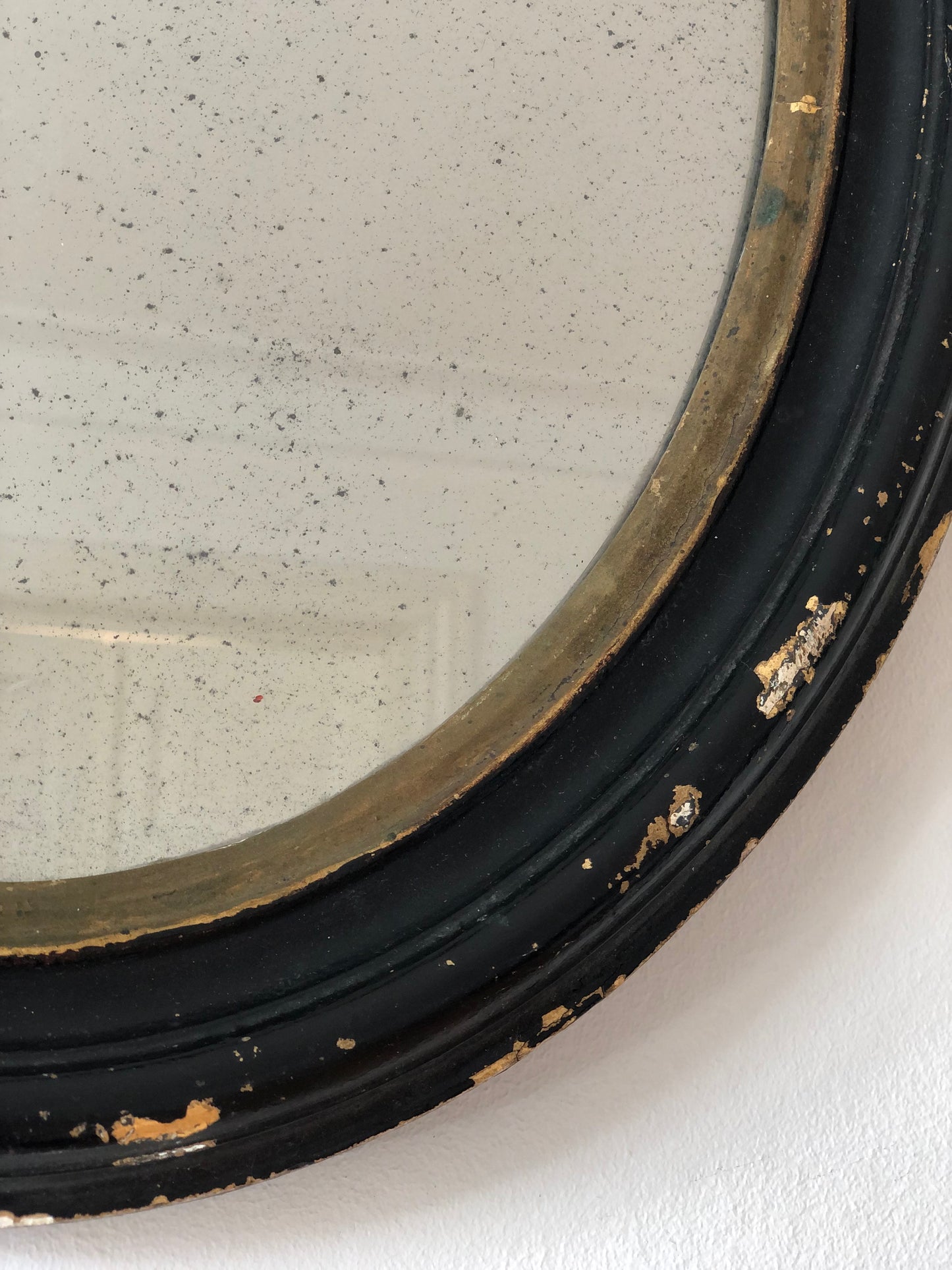 Antique Louis Philippe Oval Mirror in Black and Gold France Late 19th Century