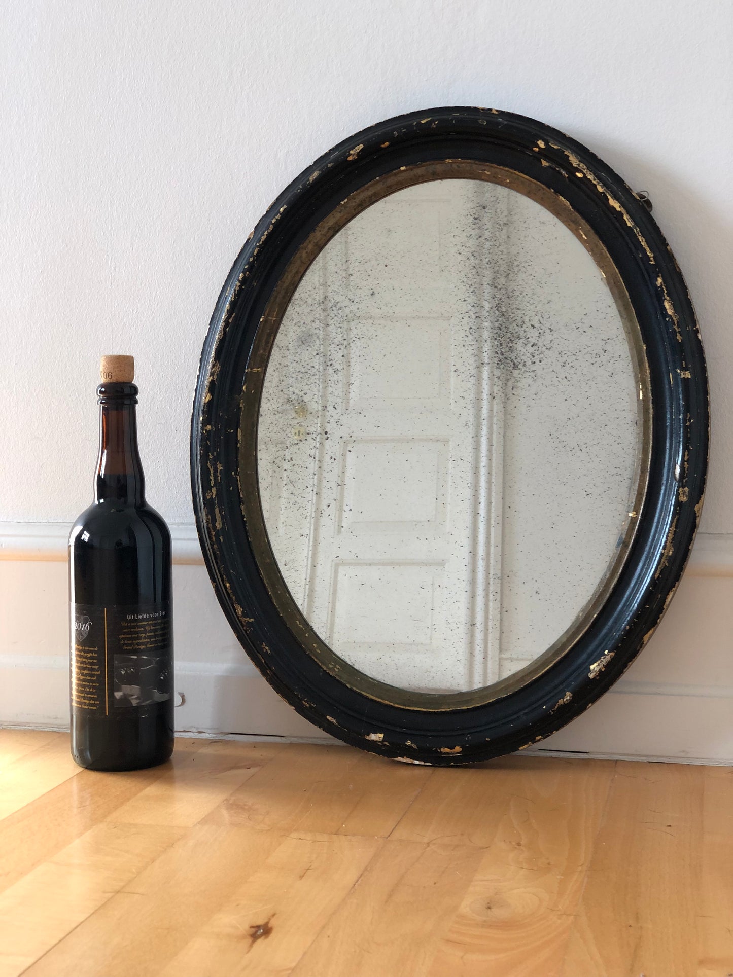 Antique Louis Philippe Oval Mirror in Black and Gold France Late 19th Century