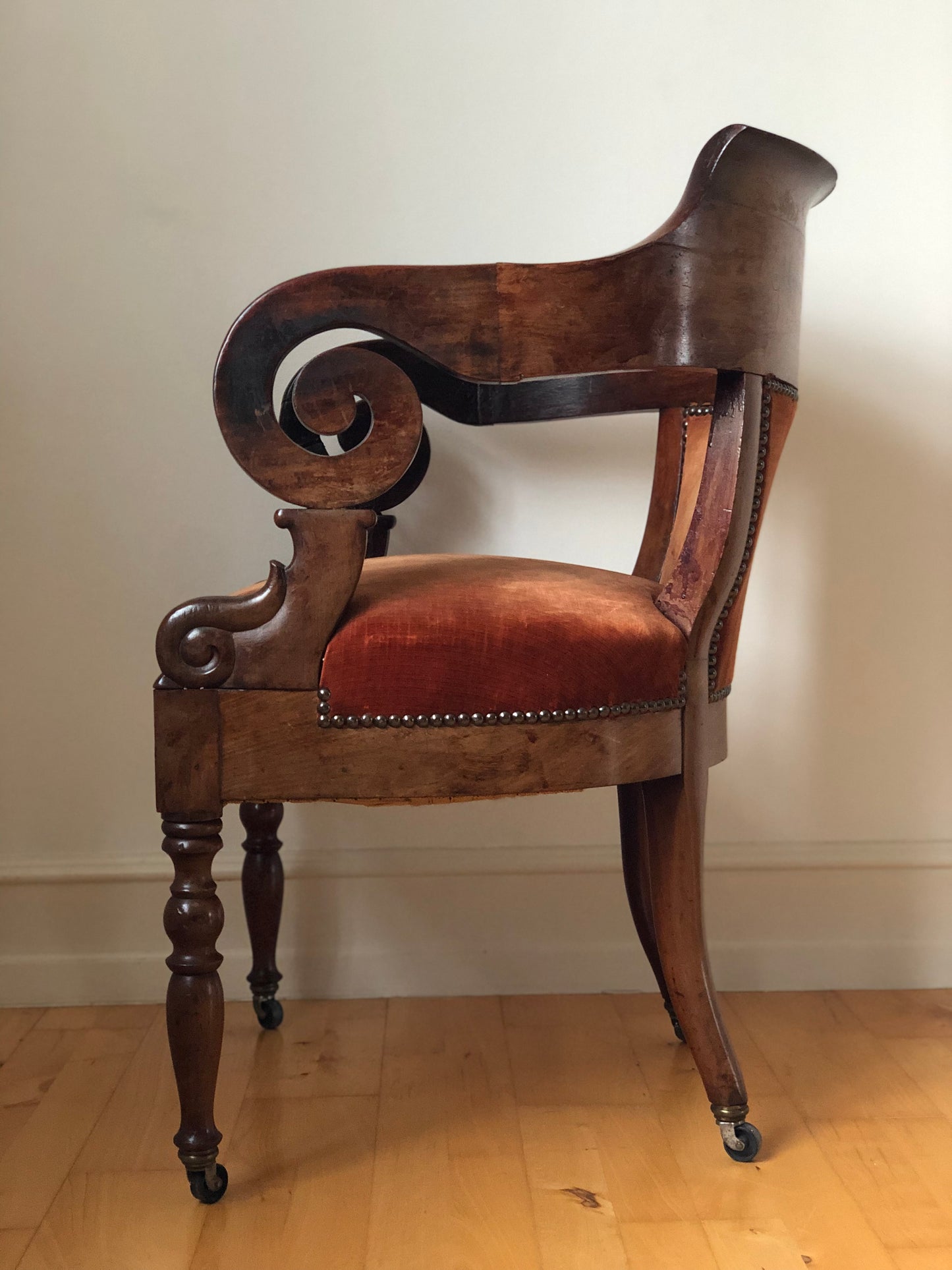 Antique Mahogany Armchair with Burgundy Fabric and Casters United Kingdom