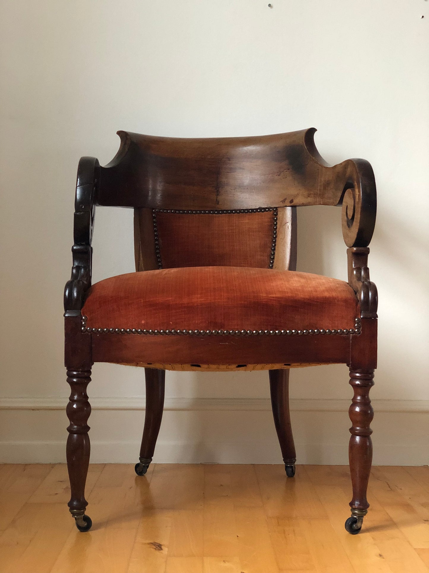 Antique Mahogany Armchair with Burgundy Fabric and Casters United Kingdom