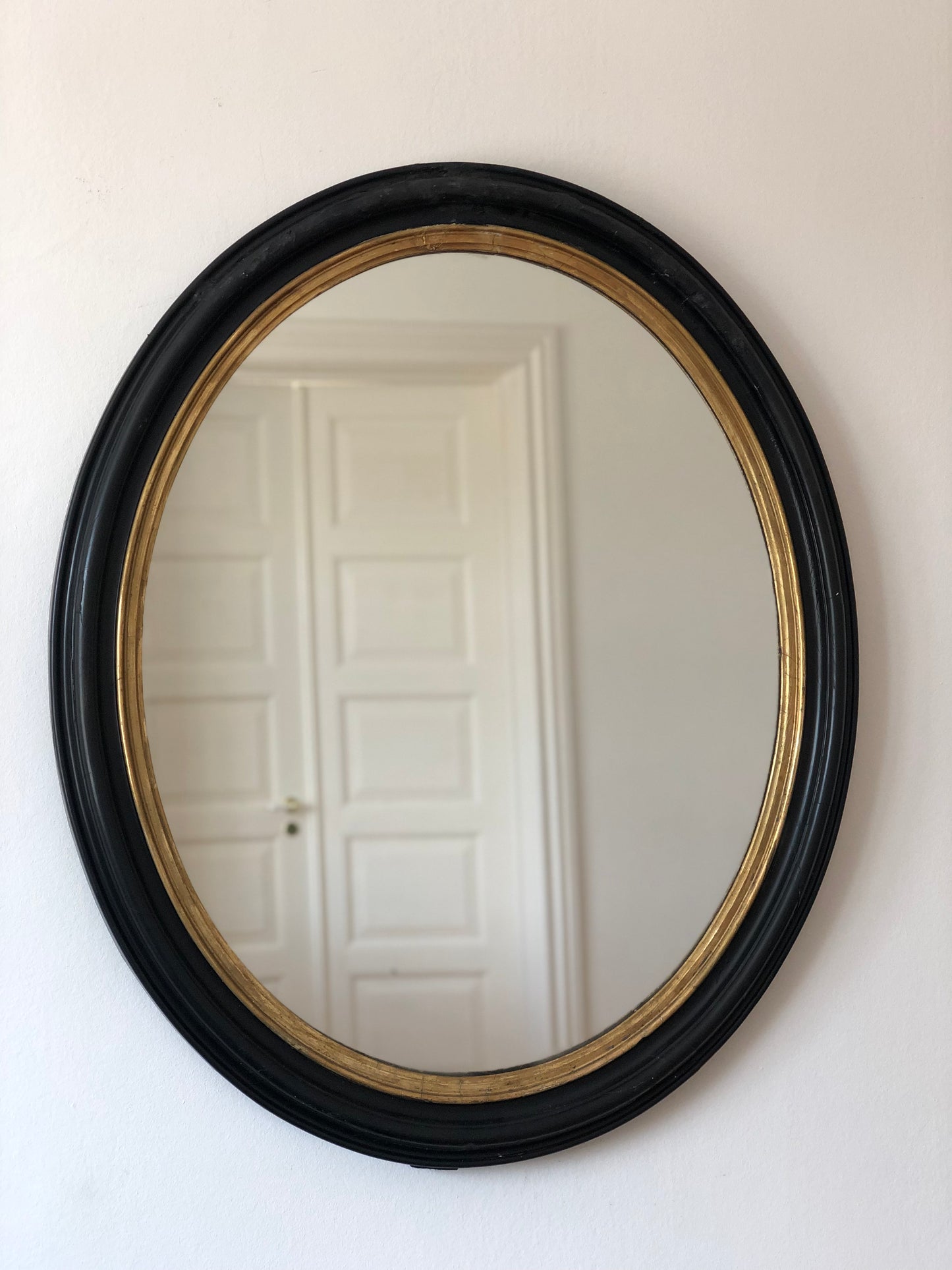 Large Antique Louis Philippe French Oval Mirror in Black and Gold, Late 19th Century
