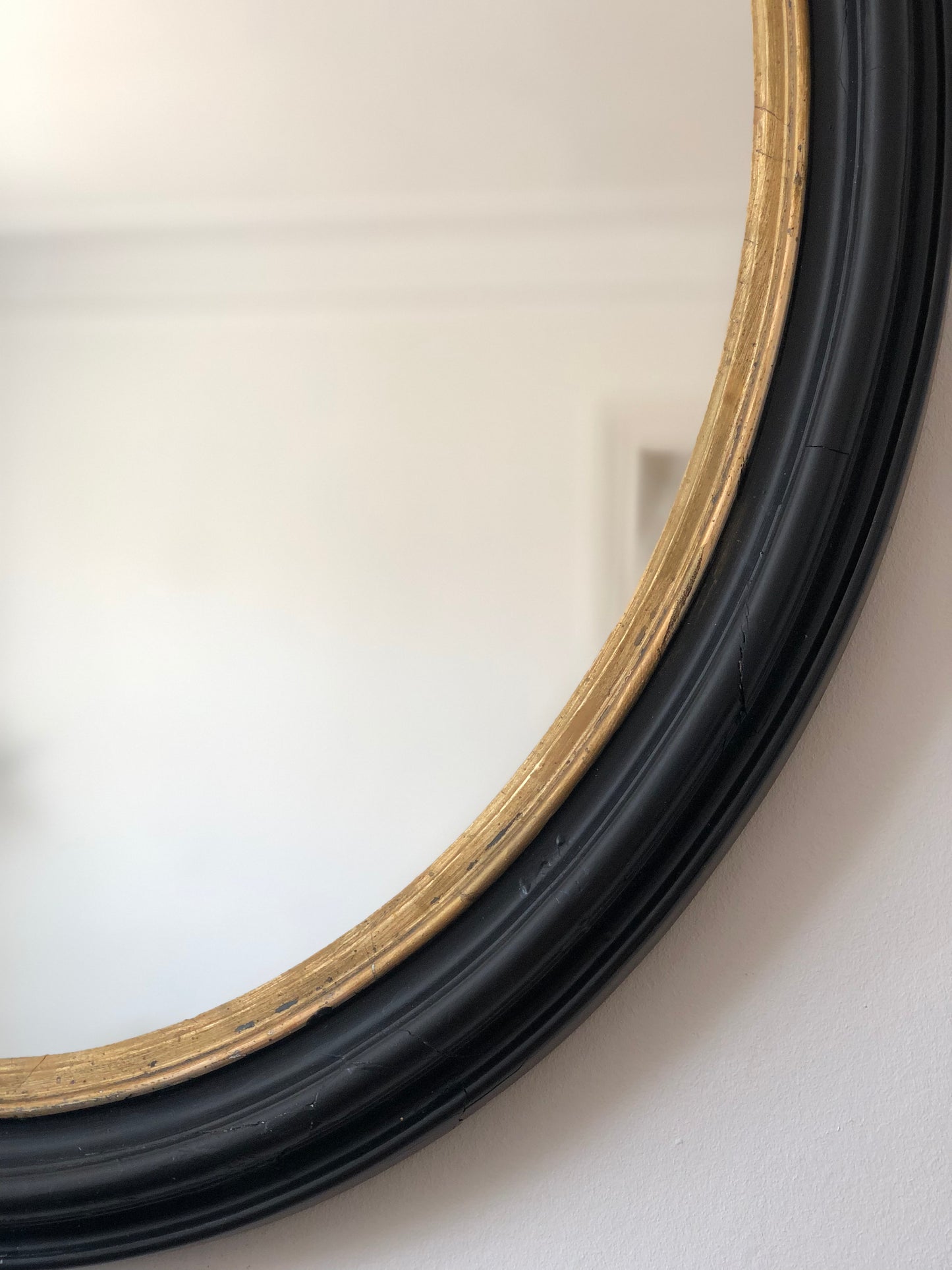 Large Antique Louis Philippe French Oval Mirror in Black and Gold, Late 19th Century